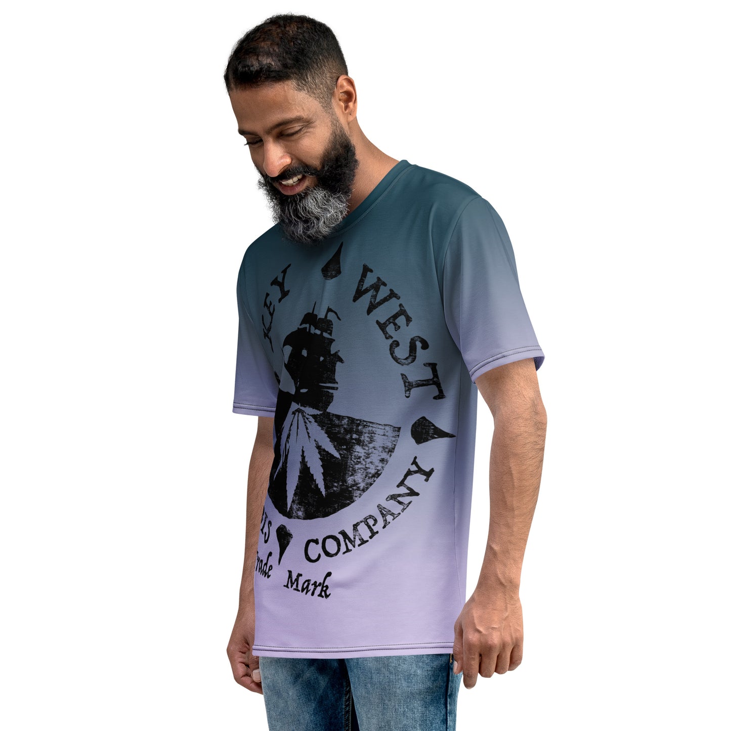Man modeling the Key West Cannabis Company Brand T-shirt with oversize print on a gradient background from the left quarter front.