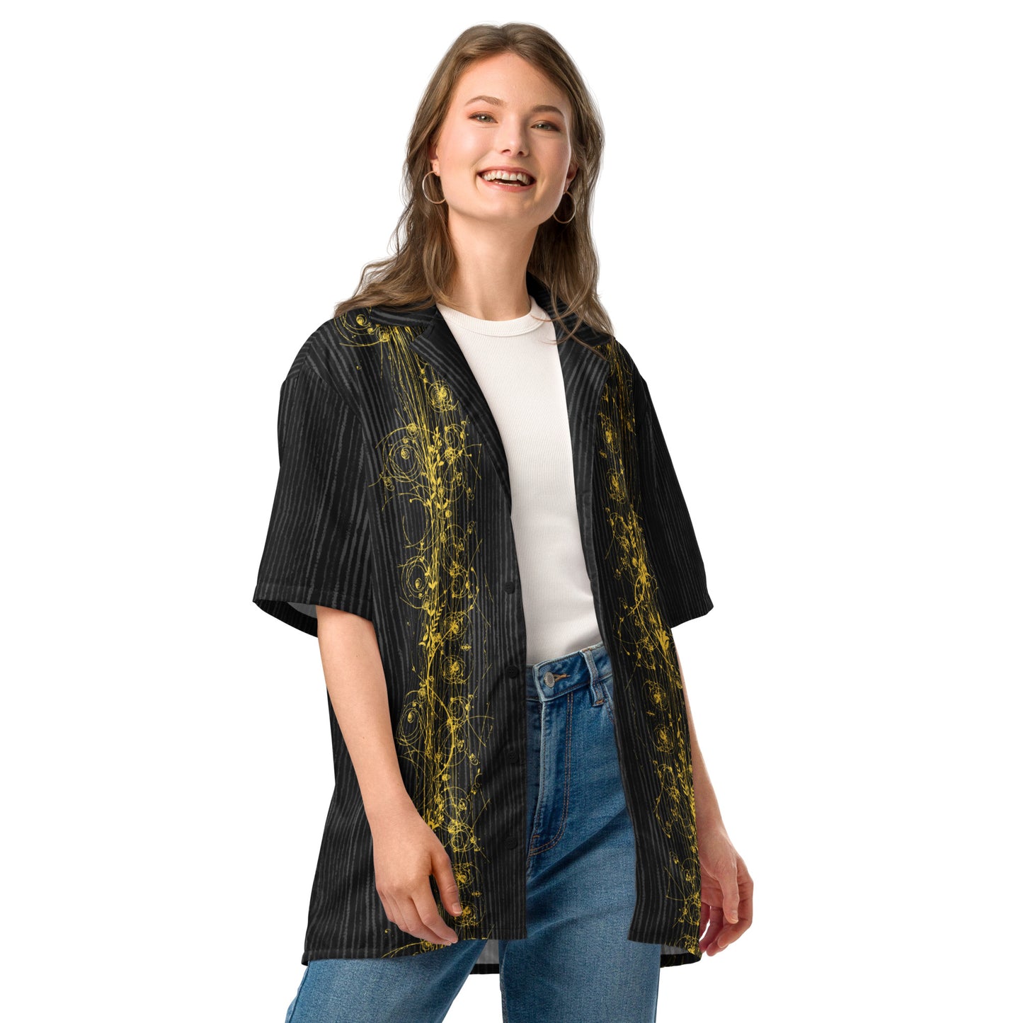 Woman modeling the Anura Theta Button Shirt from the side front showing the gold particle energy design.
