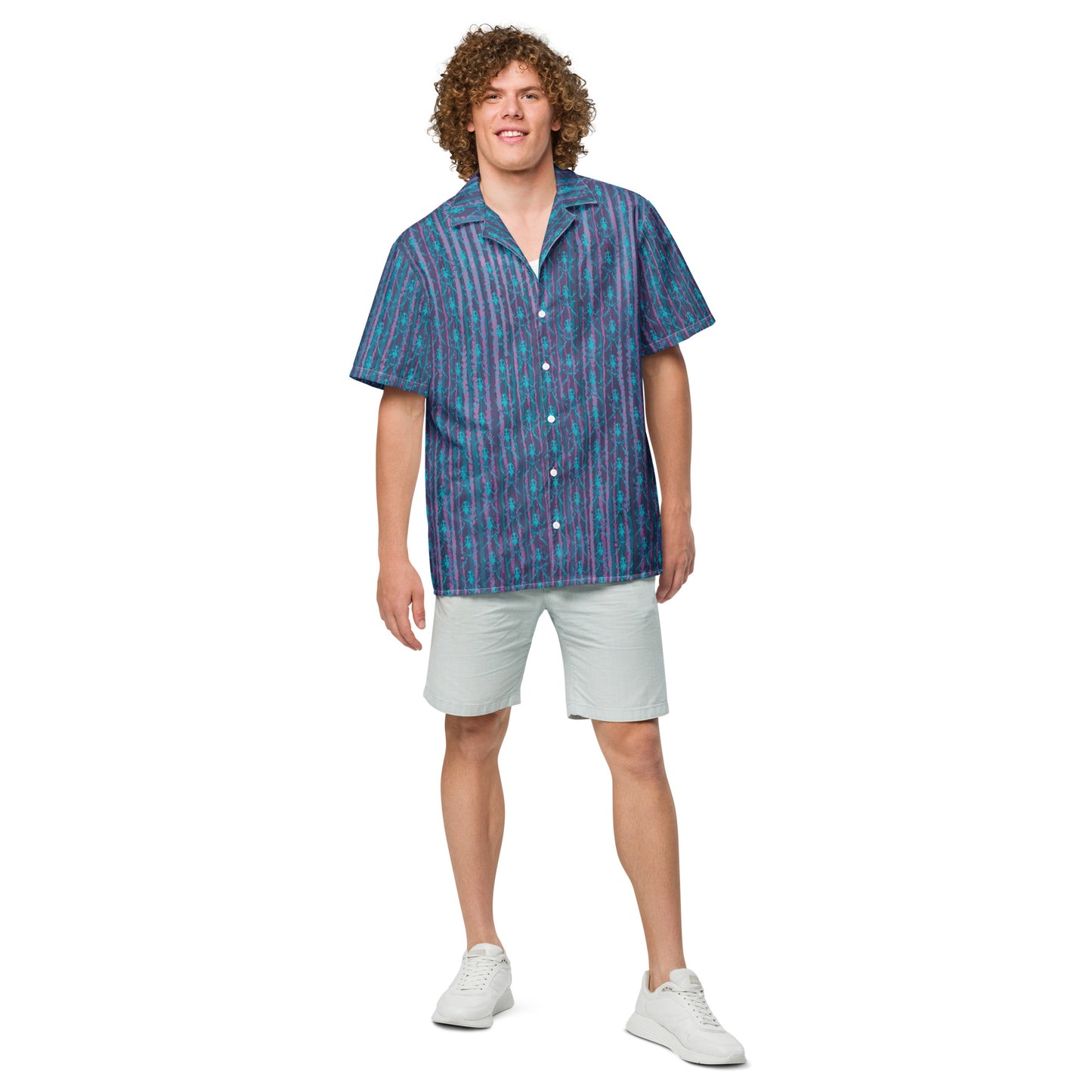 Model wearing the Anura button down shirt with turquoise frog bones from the front.