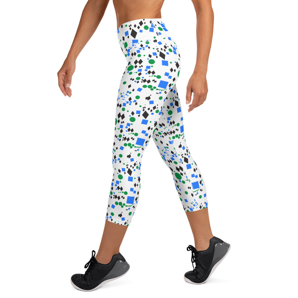 Woman modeling the Trail Marker capri leggings from the left side.