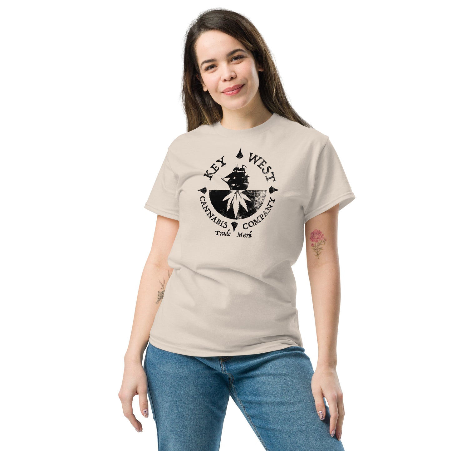 Woman modeling the Key West Cannabis Company Brand graphic in black on a Natural Color T-shirt from the front.