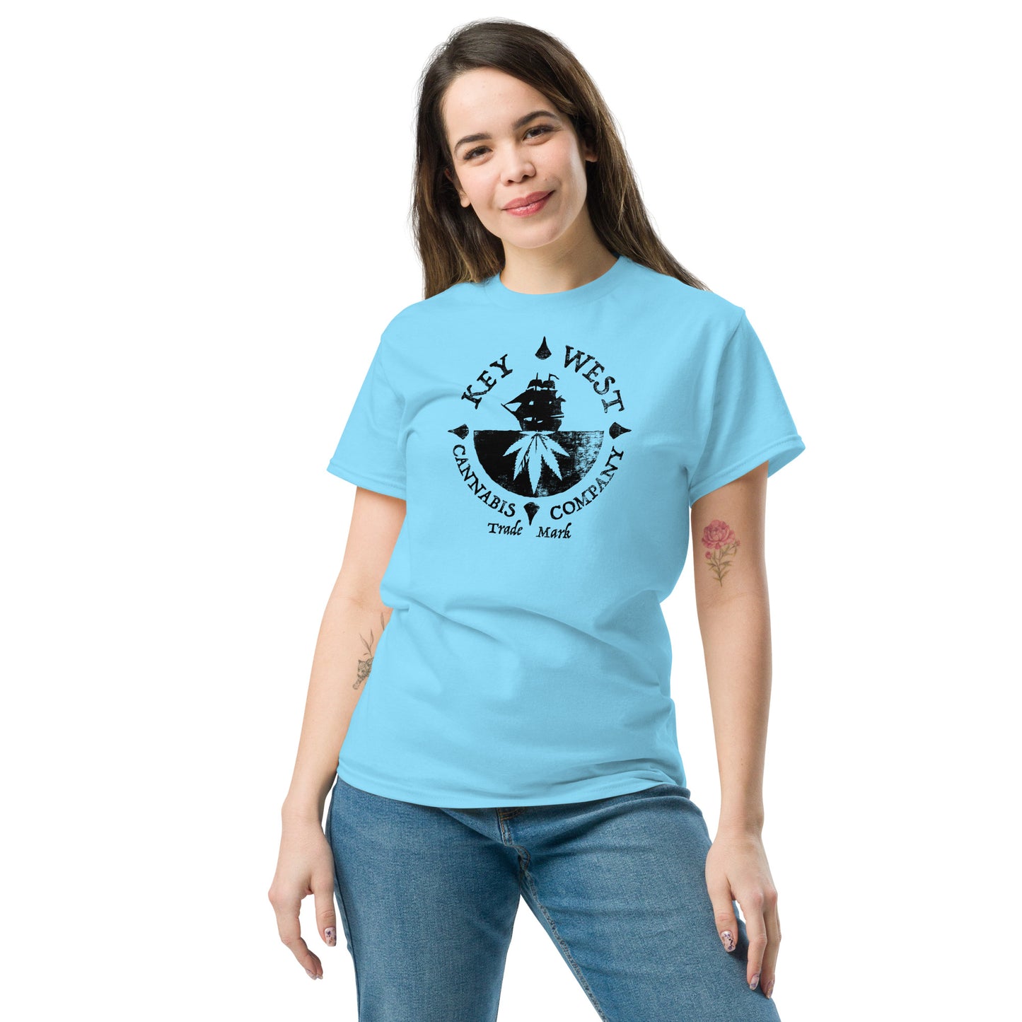 Woman modeling the Key West Cannabis Company Brand graphic in black on a Sky Color T-shirt from the front.