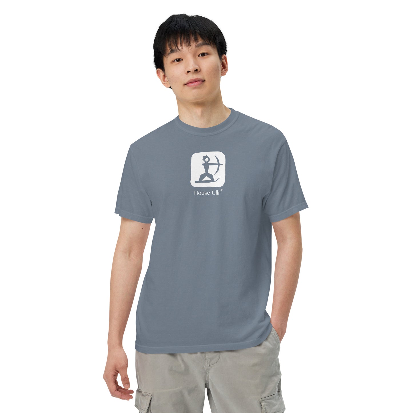 Close up of Man Modeling the House Ullr graphic in white on a blue-jean color t-shirt from the front.