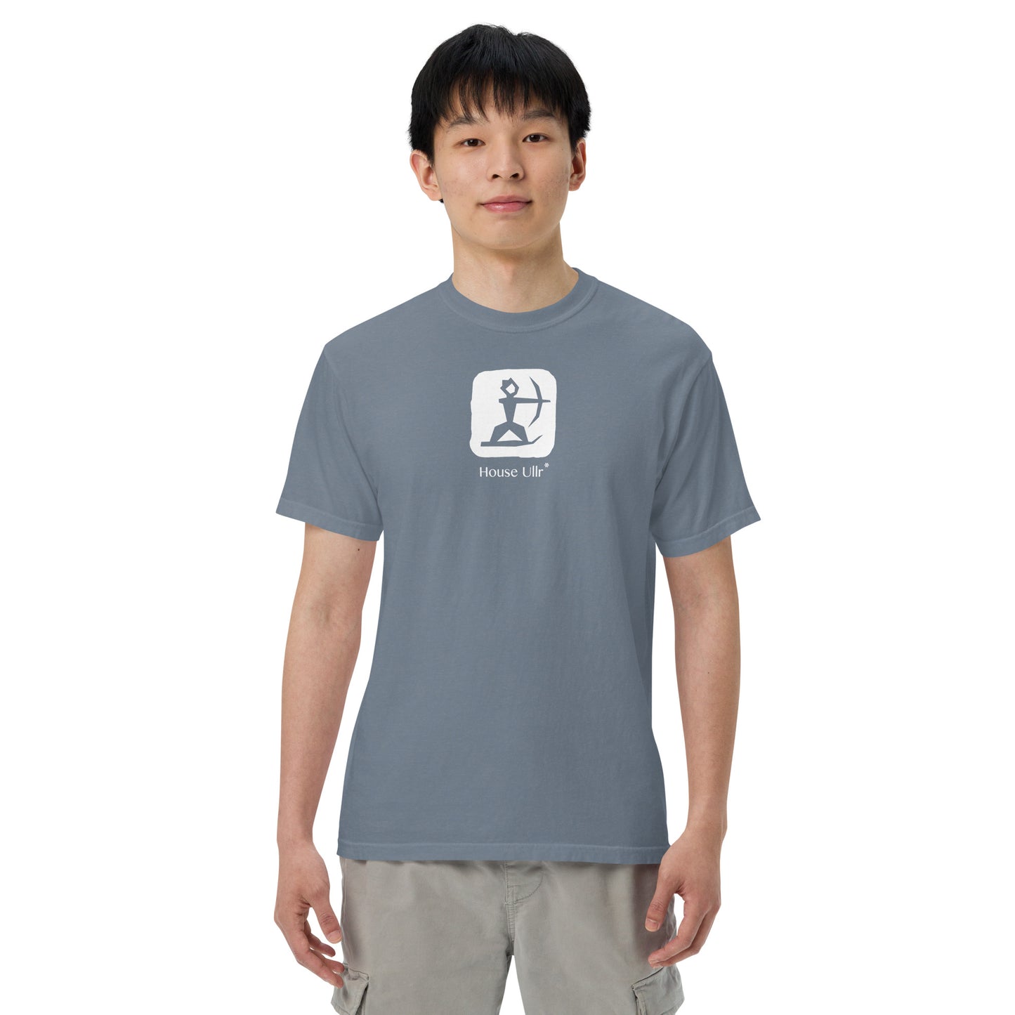 Close up of Man Modeling the House Ullr graphic in white on a blue-jean color t-shirt from the front.