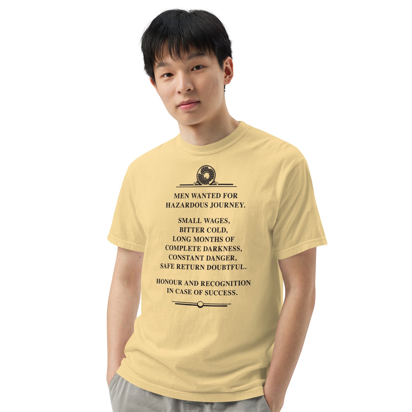 Model with hands in pockets wearing the Constant Danger T-Shirt in black on bananna color from the front.