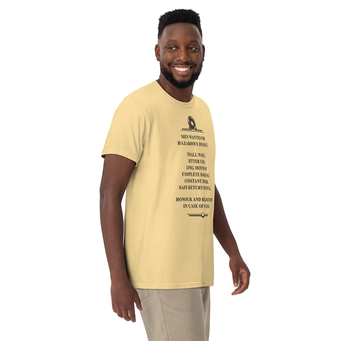 Model wearing the Constant Danger T-Shirt in black on bananna color from the lrigh front.