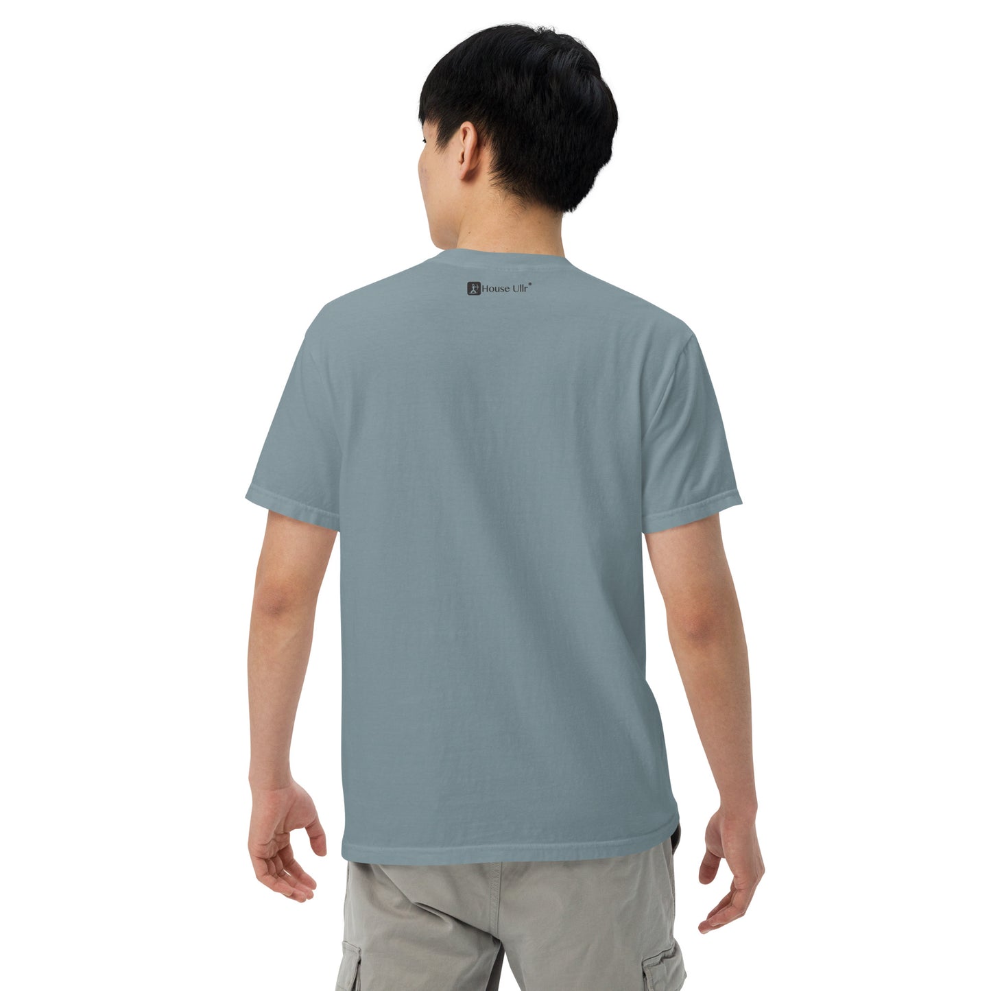 Man modeling the Key West Cannabis Company Brand T-shirt in Ice Blue from the back.