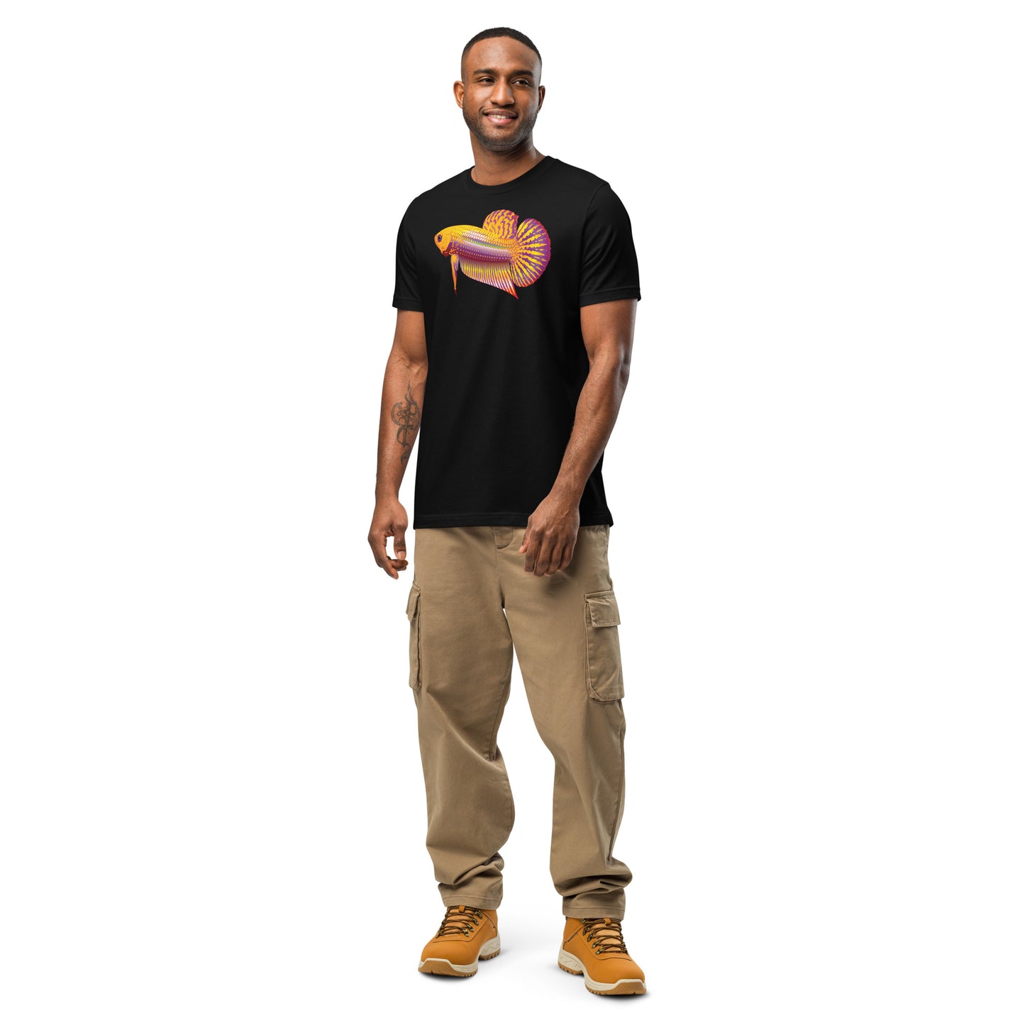 Man shown wearing a Gold Betta Jai print on a black t-shirt from the front.